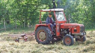 Classic Zetor 4911 turning hay in south west France 20 years ago with Kuhn single rotor Gyrorake