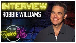 Robbie Williams Better Man Interview: "I Didn't Derive Any Joy From All the Success That I Had"