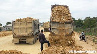 Incredible dump truck unloading dirt, Dump truck working on road