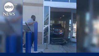 Several injured after driver plows into CarMax