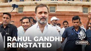 India's opposition leader Rahul Gandhi returns to parliament