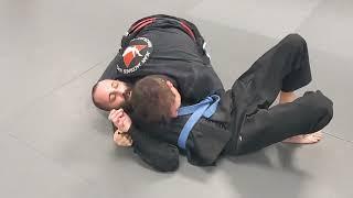 Jean Jacques Machado Rolling with Blue Belt Student