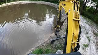 Grading Seeding and  Strawing The Forgotten Pond