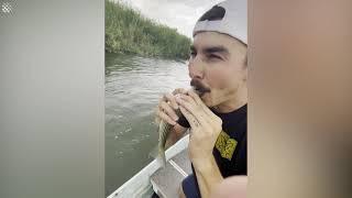 Bizarre moment man saves dying fish by performing CPR