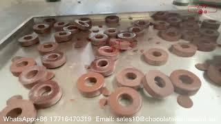 Donut chocolate molding he demolding process.