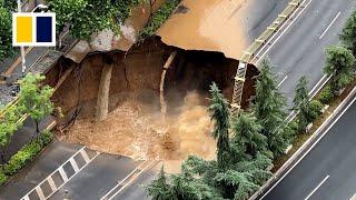 Road collapses, forming massive sinkhole at construction site in China