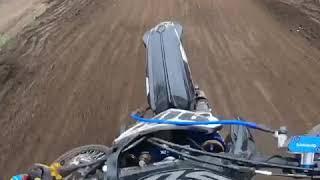 Luke Lockhart crash landing on top of other rider at Riverside Raceway