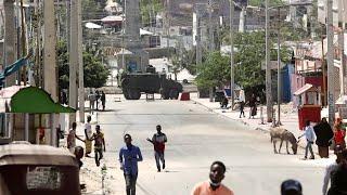 Gunfire erupts in Mogadishu, streets sealed off