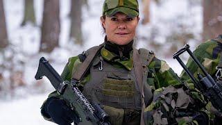 Crown Princess Victoria shooting and training with military personel