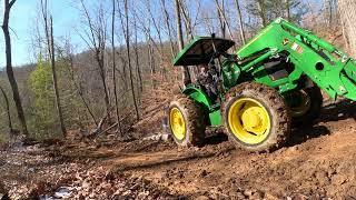 First Taste of Real Work for the new Deere! Skidding logs, spreading gravel.