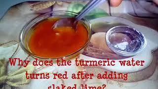 Why does turmeric water turns red after adding slaked lime ?