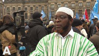 Demonstranten betuigen steun aan Oeigoeren op de Dam