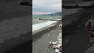 12 Sochi storm at sea. swimming bansunbathing on the shore.