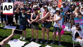 Protesters hold 'Hands Off!' rally against Trump and Elon Musk in Charlotte