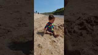 Naby playing in the sand at Holywell Bay #toddler