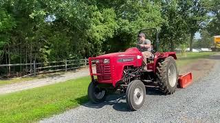 Everything Attachments land leveler on a Mahindra 4025