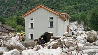 Swiss village covered in rocks after flooding and landslides | AFP