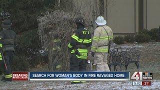 Firefighters search for woman in burned KC home