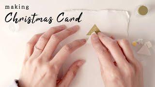 Making Christmas card using a cutter knife and erasers