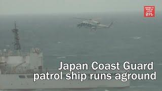 Japan Coast Guard patrol ship runs aground