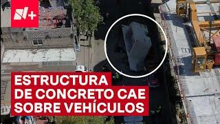 Estructura cae sobre vehículos por falla de grúa hidráulica - N+