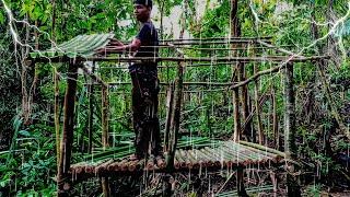 Camping Heavy rain thunderstorm building a warm and cozy shelter in the forest