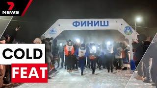 Marathon runners in Russia brace icy conditions | 7NEWS