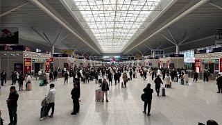 GLOBALink | Experiencing Spring Festival travel rush at railway hub in central China