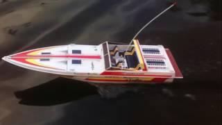 MRC/Acoms Excalibur 40 Hawk RC Boat in the street during  flood