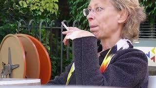 Mature woman smoking cigarette candid