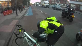 Cyclist flys off bike at red light