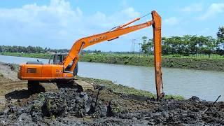 Mud Sedimentation Excavating From The River Using Long Reach Excavator