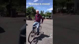 Old Man Riding Bike Backwards