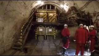 Ride in mine shaft cage from depth 500 m to the surface