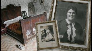 Abandoned house with portraits