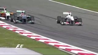 Kobayashi slips past Schumi on the grass…