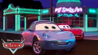The Neon Lights Turn On At Radiator Springs | Pixar Cars