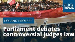 Polish parliament defies EU by passing controversial law to fire judges