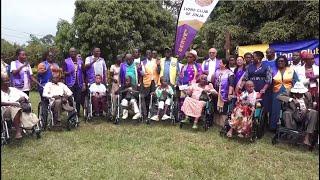 Lion club Jinja - Donated wheelchairs and food items to persons with disability