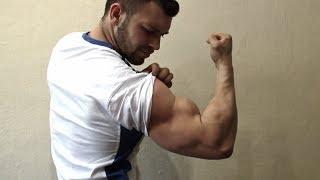 GIANT PUMPED BICEPS RIPS SHIRT OFF