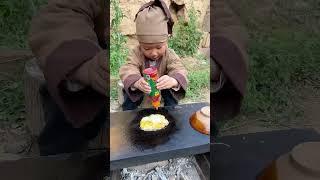 Mountain tribal kid knows how to make an amazing breakfast