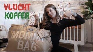 WAT ZIT ER IN MIJN VLUCHTKOFFER?  / VLOGMAS DAG 7