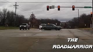 BMW Drives over a Median and a Minivan runs a red light