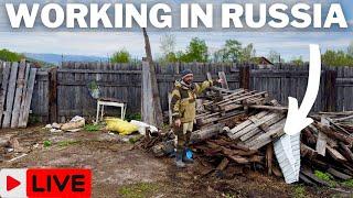 American Working On Building A House In Russia