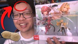 I struggle to UNBOX the Pyra & Mythra Amiibo...