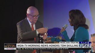 Tom Skilling turns over his keys and ID to "Corporate Erin"