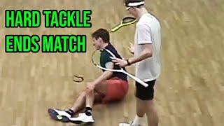 SQUASH. Final ends early after this hard tackle