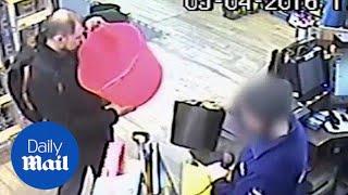 CCTV of Stefano Brizzi and policeman Gordon Semple - Daily Mail