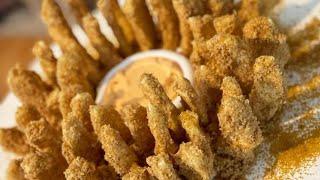 Here's What Really Makes Outback's Bloomin' Onion So Delicious