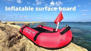 Inflatable surface board